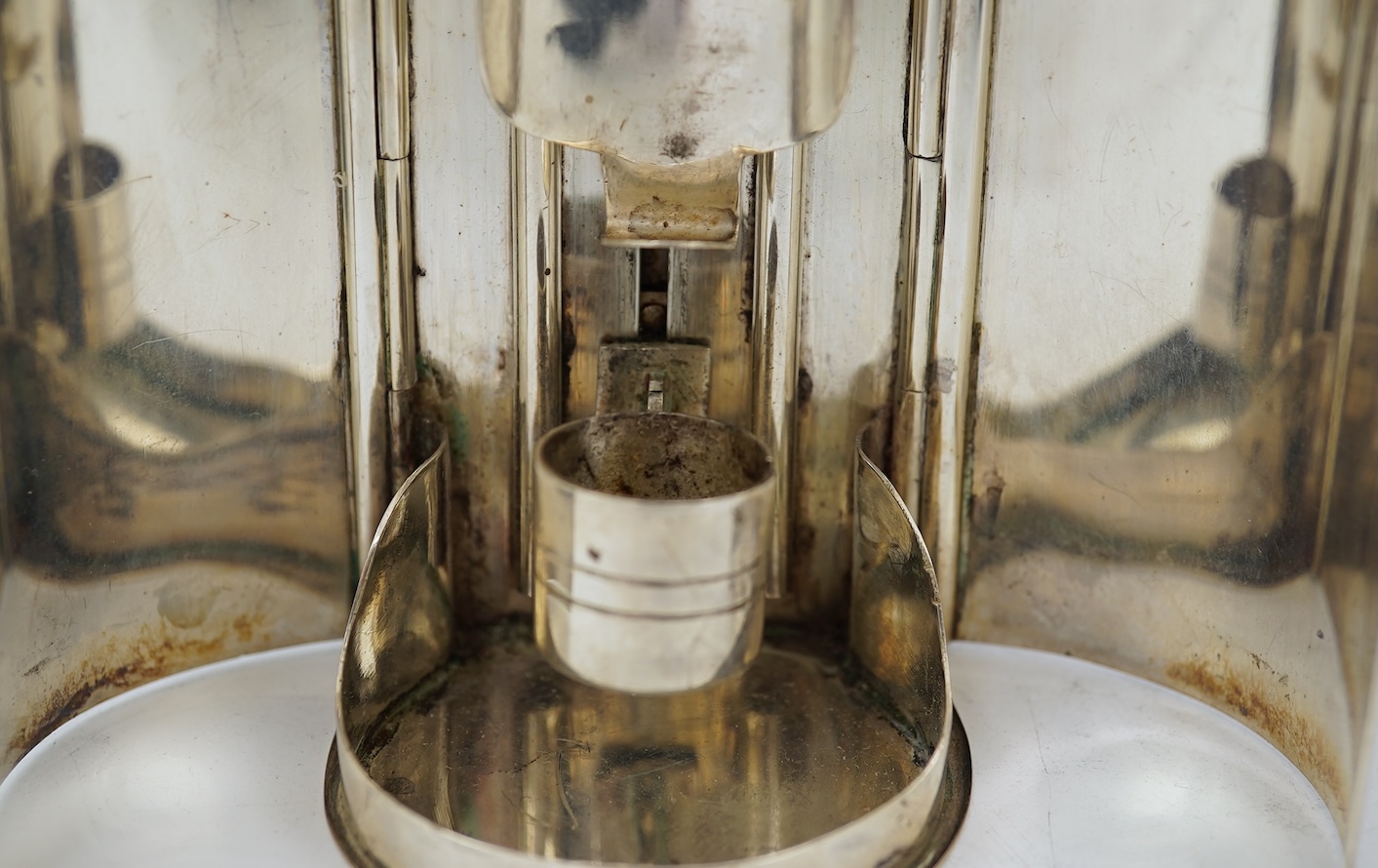 A Victorian silver travelling coach lamp by Thomas Johnson I, in original fitted leather case, retailed by Leuchers, 38 Piccadilly, London